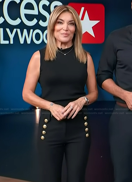 Kit's black pants with gold buttons on Access Hollywood