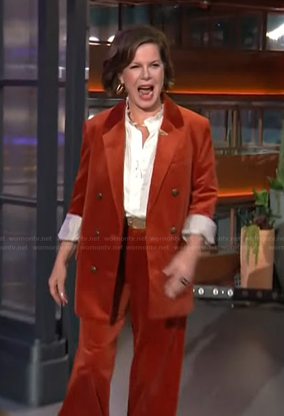 Marcia Gay Harden's orange velvet blazer and pants on The Kelly Clarkson Show