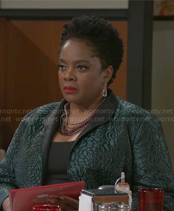 Mona's green jacquard jacket on Beyond the Gates