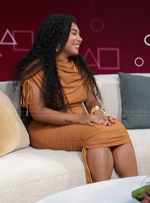 Perla Figuereo's brown ruched dress on Access Hollywood