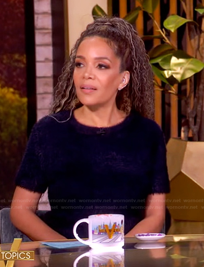 Sunny's navy cashmere top and skirt on The View