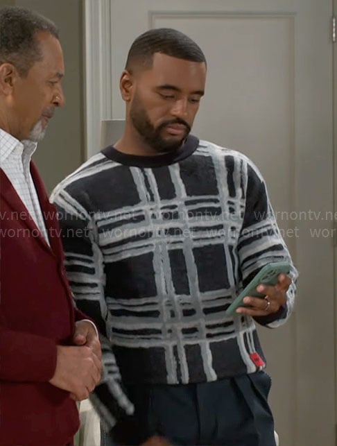 Andre's checked print sweater on Beyond the Gates