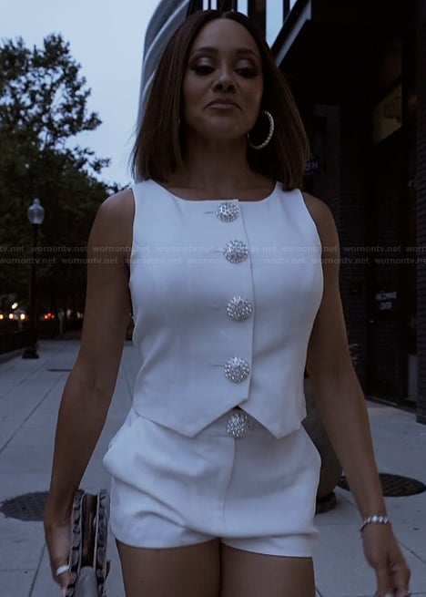 Ashley's white button vest on The Real Housewives of Potomac
