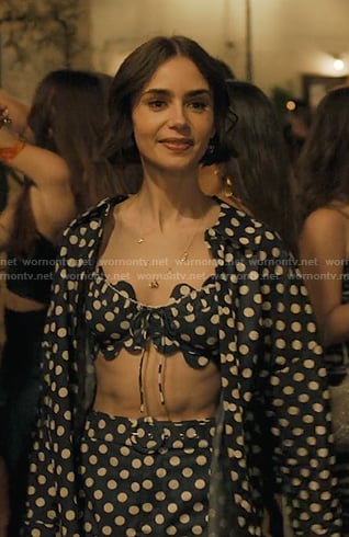 Emily's navy polka dot shirt and shorts on Emily in Paris
