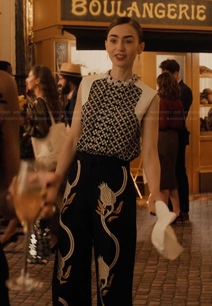 Emily's printed vest and floral pants on Emily in Paris