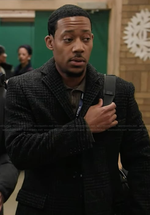 Gregory's black plaid coat on Abbott Elementary