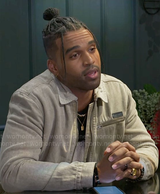 Izaiah's beige jacket on Beyond the Gates