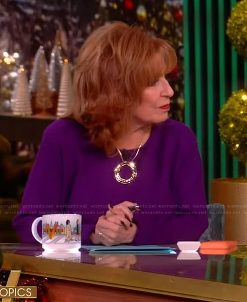 Joy's purple sweater and circle necklace on The View