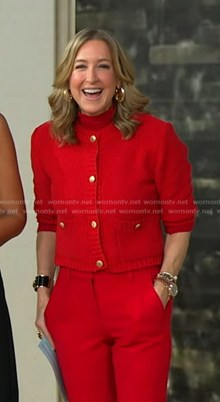 Lara's red knit cardigan nad front slit pants on Good Morning America