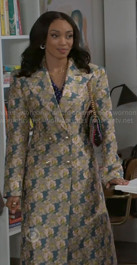 Madison's long floral coat on Beyond the Gates