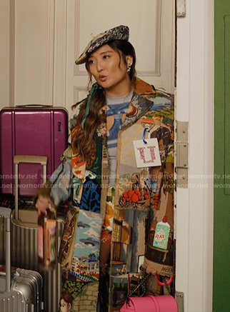 Mindy's print trench coat and blue cutout top on Emily in Paris