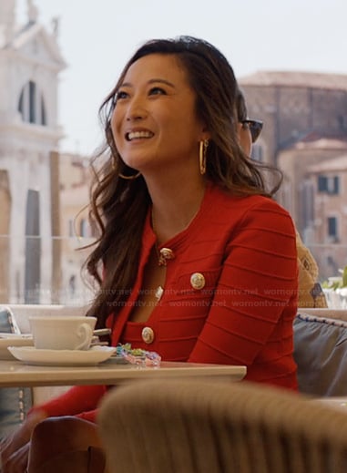 Mindy's red ribbed cardigan and shorts on Emily in Paris