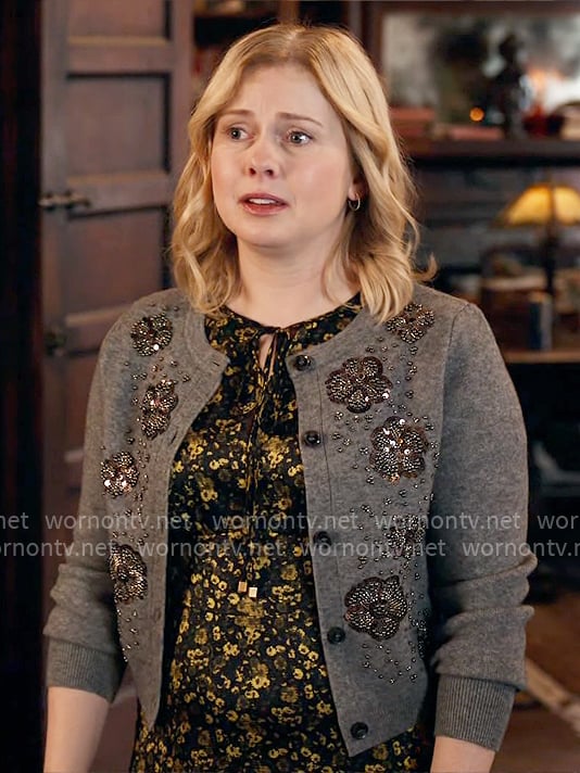 Sam's floral dress and grey embellished cardigan on Ghosts