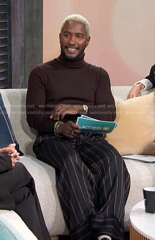 Scott's brown turtleneck and navy striped pants on Access Hollywood