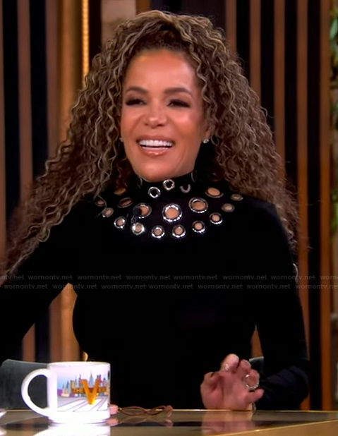 Sunny's black grommet embellished top on The View