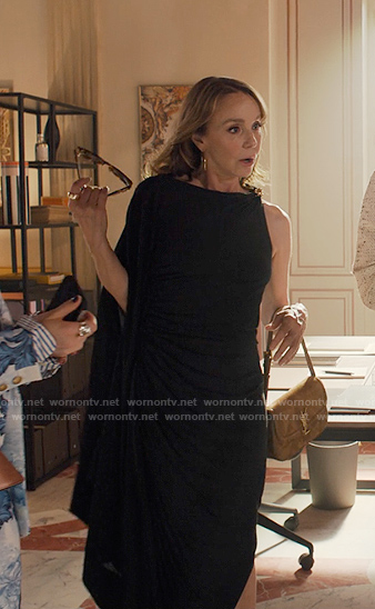 Sylvie's black one-shoulder draped dress on Emily in Paris