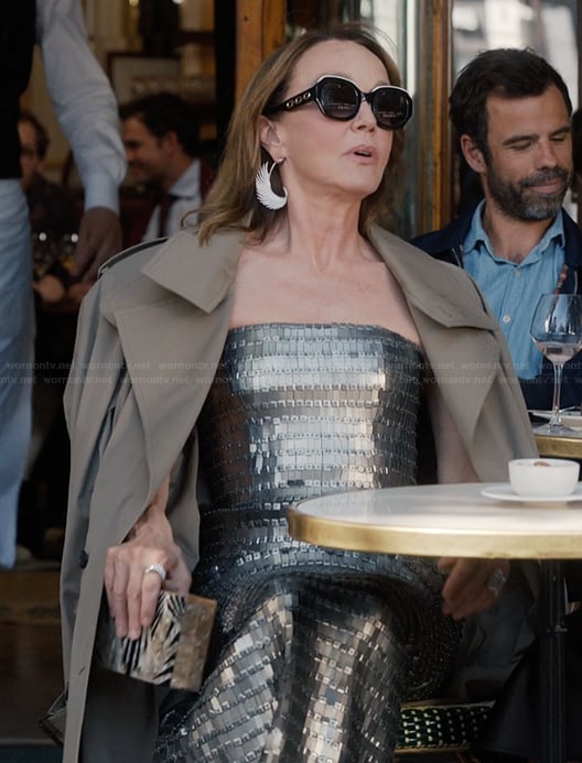 Sylvie's silver metallic dress and sunglasses on Emily in Paris