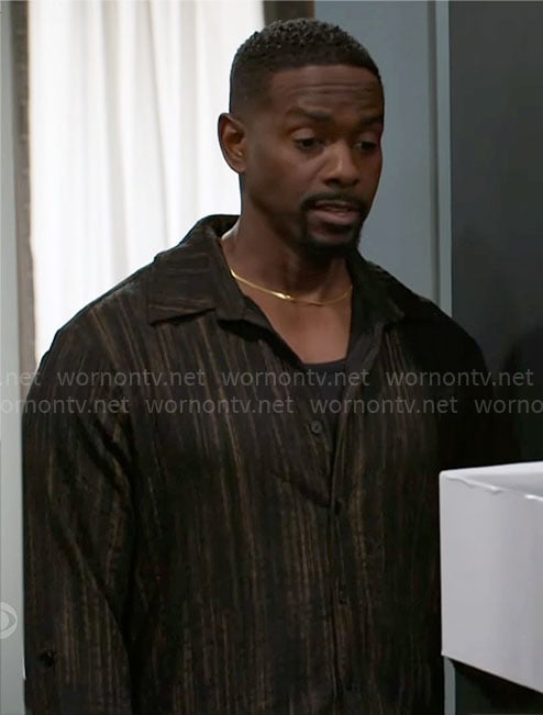 Ted's black and gold stripe shirt on Beyond the Gates