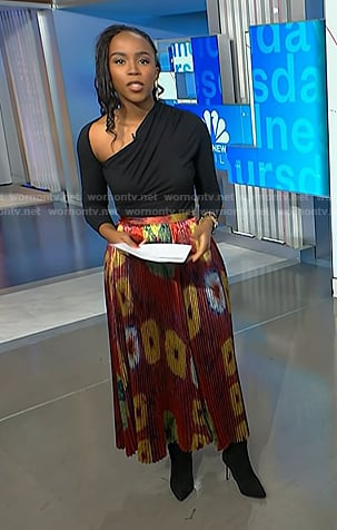 Zinhle's black asymmetric top and print pleated skirt on NBC News Daily