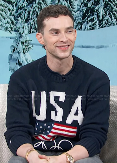 Adam Ribbon's navy USA Olympics sweater on Access Hollywood