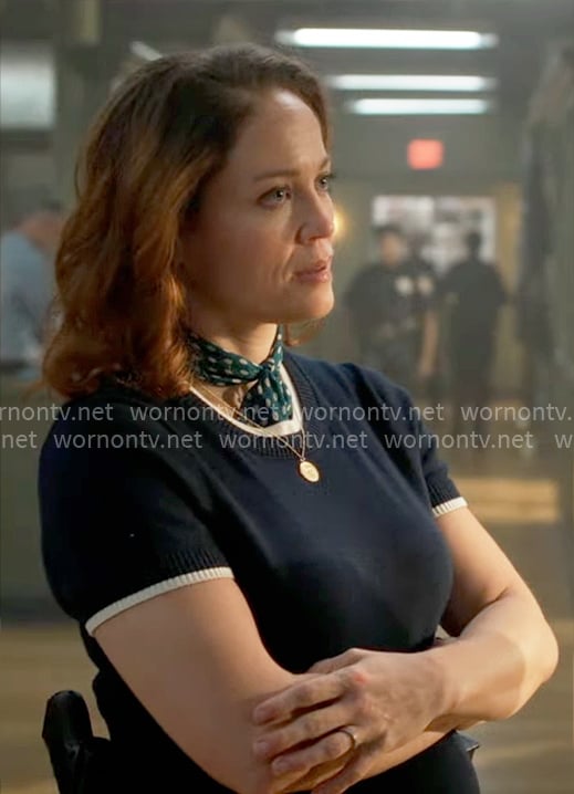 Angie's navy short sleeve sweater with white trims on Will Trent