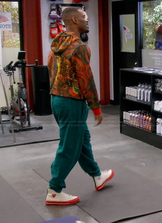 Bernard's white canvas high top sneakers on The Upshaws
