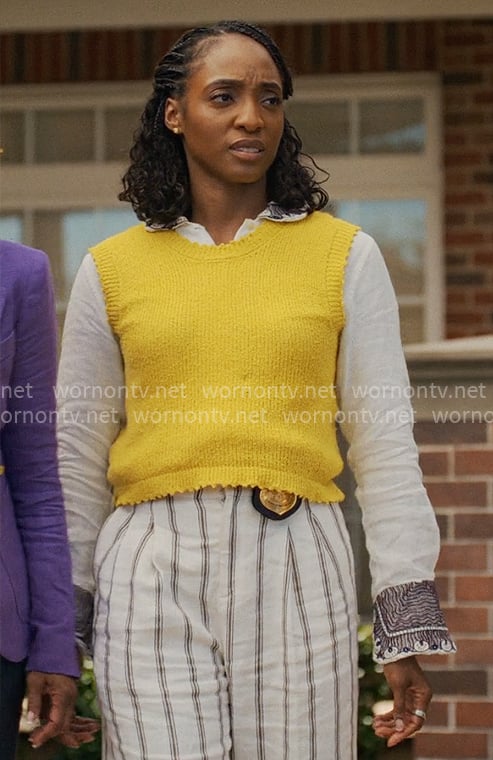Faith's yellow sweater vest, striped pants and embroidered shirt on Will Trent