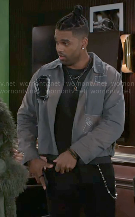 Izaiah's grey patch jacket on Beyond the Gates
