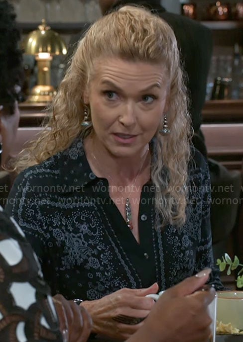 Jan's navy printed shirt on Beyond the Gates