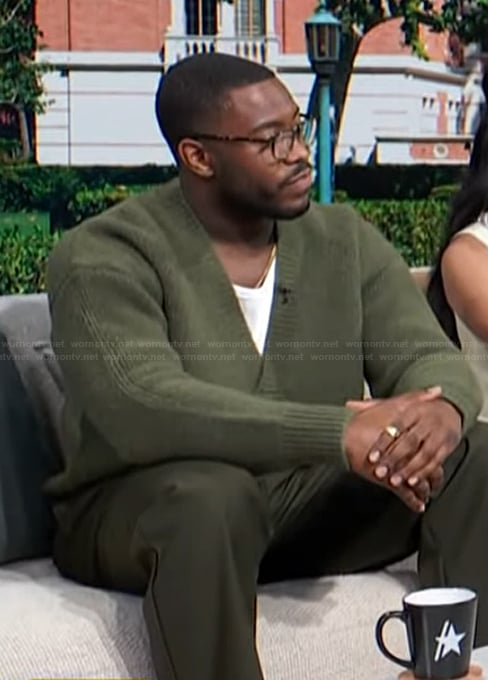Jarrett Austin Brown's green cardigan on Access Hollywood
