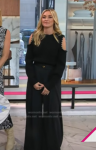 Jasmine Snow's black cold-shoulder sweater and wide leg pants on Today
