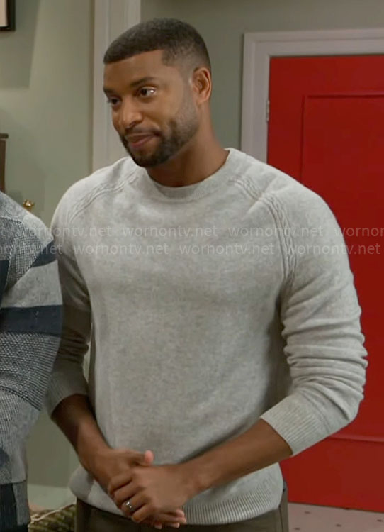 Martin's grey sweater with cable knit details on Beyond the Gates