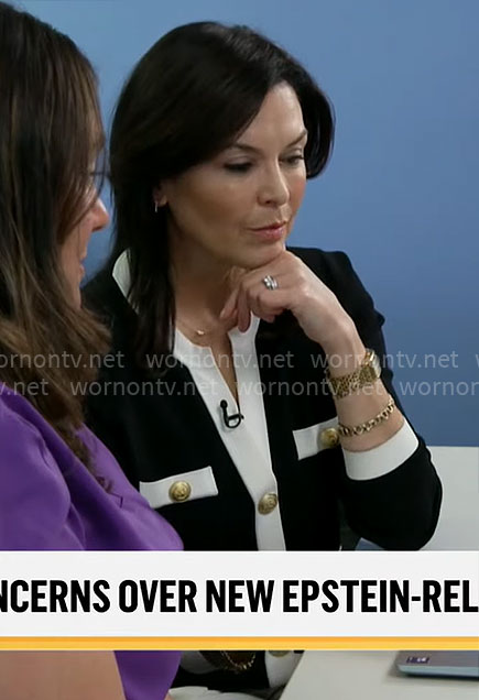 Meg Oliver's black and white cardigan with gold buttons on CBS Mornings