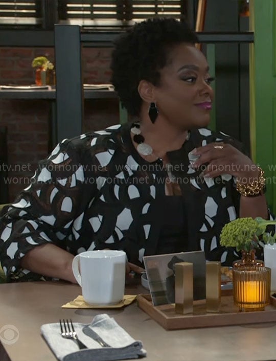 Mona's black and white jacket on Beyond the Gates
