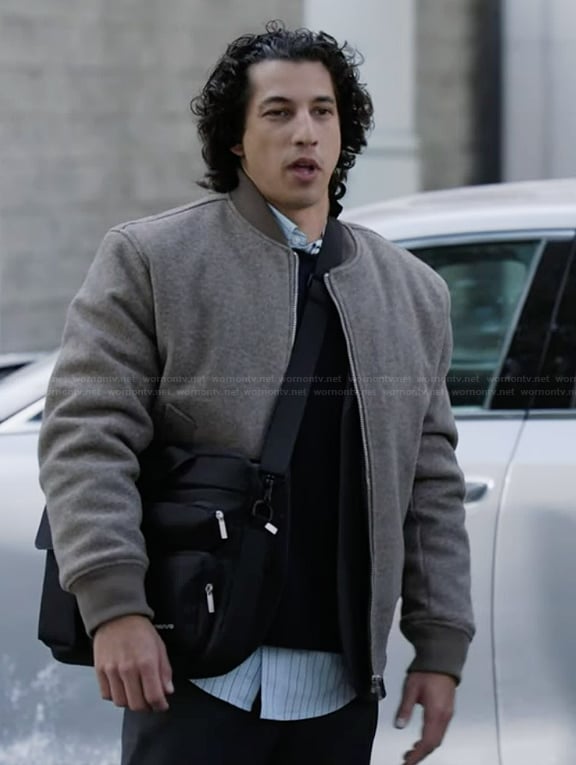 Simon's beige knit bomber jacket on Abbott Elementary