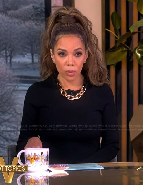 Sunny's black chain neckline detail dress on The View