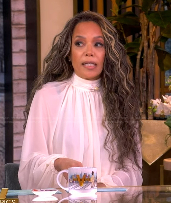 Sunny's white tie neck blouse on The View