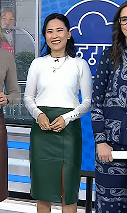Vicky's white button cuff sweater and green leather skirt on Today