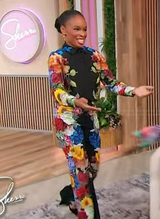 Amber Ruffin's black floral print blouse and pants on Sherri