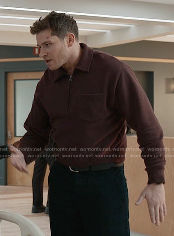 Buck's burgundy half-zip sweatshirt on 9-1-1