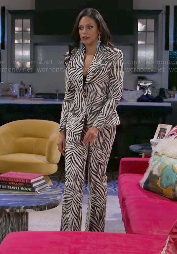 Dani's zebra print suit on Beyond the Gates