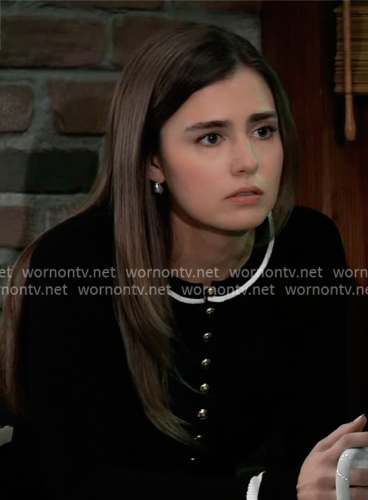 Emma's black top with gold buttons and white stripe trim on General Hospital