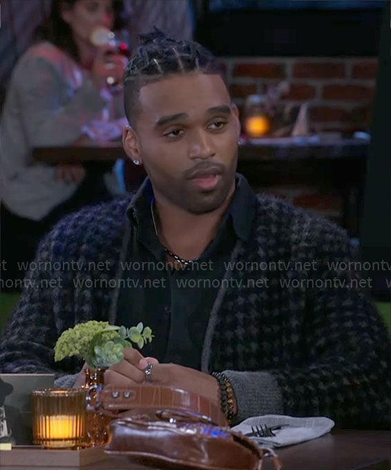 Izaiah's grey houndstooth cardigan on Beyond the Gates