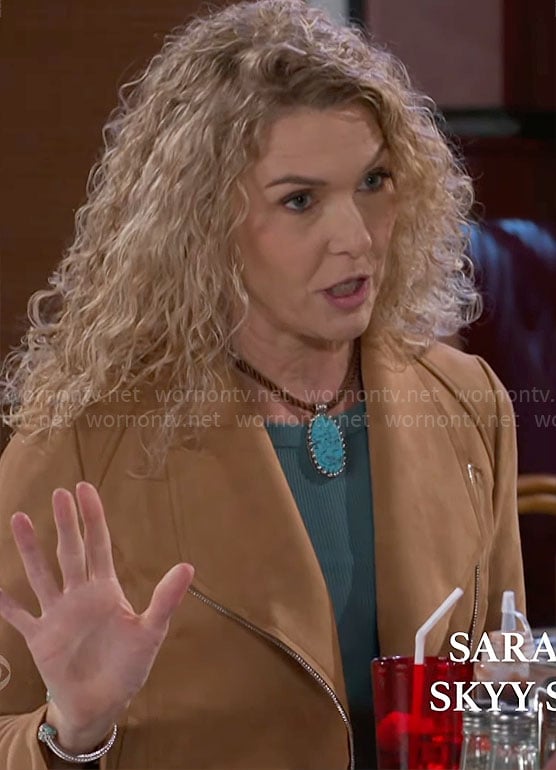 Jan's tan jacket and turquoise necklace on Beyond the Gates