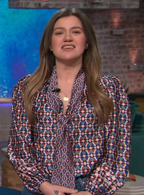Kelly's geometric print tie neck blouse on The Kelly Clarkson Show