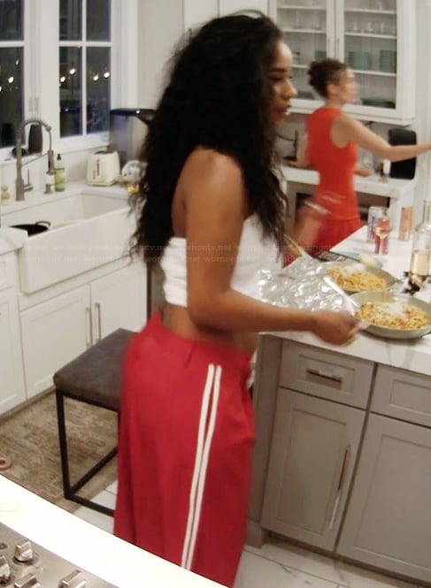 Mia's red side stripe pants on Summer House