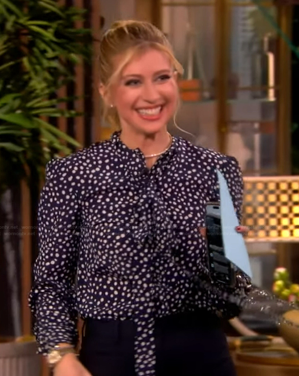 Sara Eisen's blue navy spotted tie neck blouse on The View