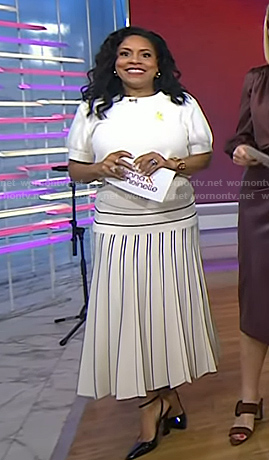 Sheinelle's white short sleeve sweater and striped skirt on Today