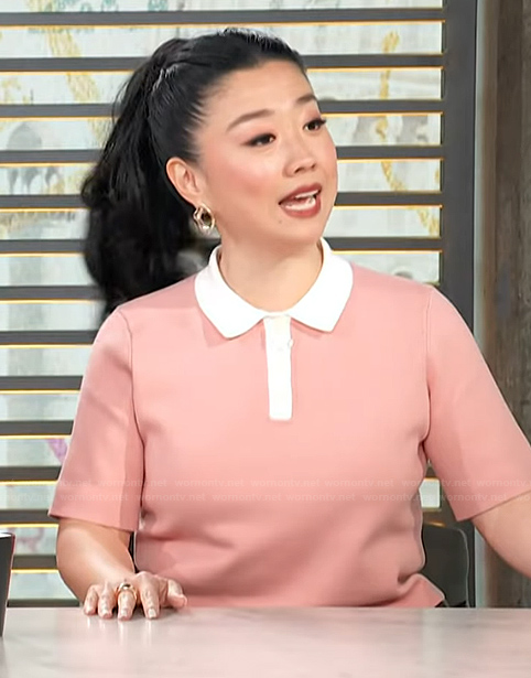Sherry Cola's pink contrast polo top on Access Hollywood