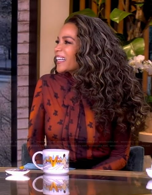 Sunny's printed mesh turtleneck top on The View